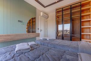 Postel nebo postele na pokoji v ubytování Arya Garden Villas Side + 57 fotografií