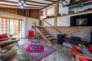 Χώρος καθιστικού στο Sítio com 5 suítes , piscina, vista incrível