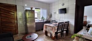 TV a/nebo společenská místnost v ubytování Casa Bela, perfeita para Descanso!