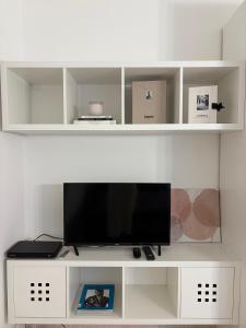 TV a/nebo společenská místnost v ubytování Mono Camelia