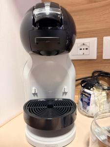 a coffee maker sitting on top of a counter at Casa da Luigina 2 in Chioggia