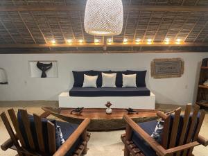 Posezení v ubytování Les Bungalows Dicilaba