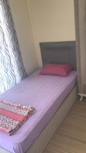 Postel nebo postele na pokoji v ubytování EBAY BEACH OTEl