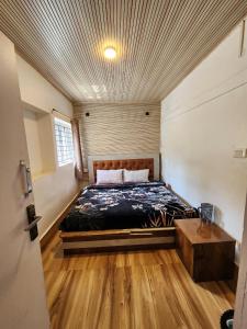 Ένα ή περισσότερα κρεβάτια σε δωμάτιο στο Wings Cottage