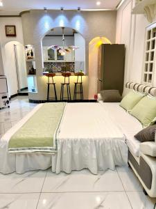 Ένα ή περισσότερα κρεβάτια σε δωμάτιο στο Hoàng Nga 1 Apartment +70 φωτογραφίες