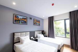 Postel nebo postele na pokoji v ubytování Novelty Hotel + 57 fotografií