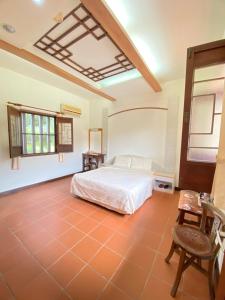 A bed or beds in a room at 懷古驛棧民宿 Még 15 kép