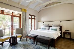 Ένα ή περισσότερα κρεβάτια σε δωμάτιο στο Casterbridge Hollow Boutique Hotel +50 φωτογραφίες