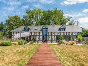 Zahrada ubytování Le Jardin des Hespérides - Piscine intérieure, Jacuzzi et Sauna