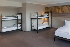 Ένα ή περισσότερα κρεβάτια σε δωμάτιο στο a&o London Docklands Riverside