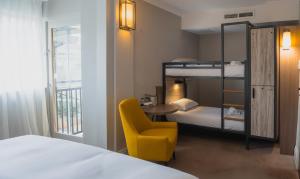 Ένα ή περισσότερα κρεβάτια σε δωμάτιο στο a&o London Docklands Riverside