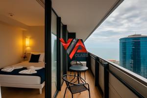 Postel nebo postele na pokoji v ubytování VIP CLASS ꙳ ORBI CITY