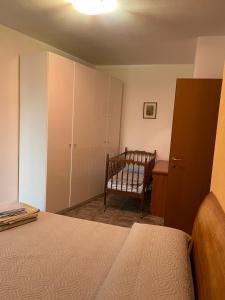 En eller flere senge i et værelse på Intero appartamento Parma Fiere