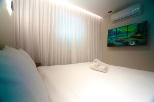 Postel nebo postele na pokoji v ubytování מילה דירות אירוח - Mila