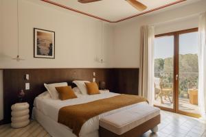 Postel nebo postele na pokoji v ubytování Boutique Hôtel Responsable et Restaurant Basgi Basgi + 57 fotografií