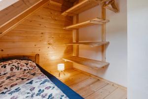 Ένα ή περισσότερα κρεβάτια σε δωμάτιο στο Tannherz