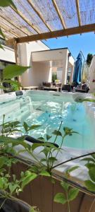 Πισίνα στο ή κοντά στο Chambres proche circuit 24h du Mans