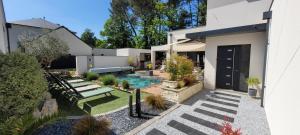 Κήπος έξω από το Chambres proche circuit 24h du Mans