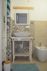 Ένα μπάνιο στο Splendor Solis Apartment