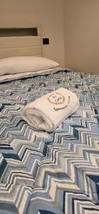 Postel nebo postele na pokoji v ubytování Re Carlo - Appartamento Filomena + 4 fotografie