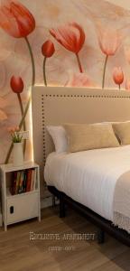 Ένα ή περισσότερα κρεβάτια σε δωμάτιο στο Exclusive Apartment Center Gijón