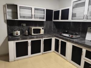 Η κουζίνα ή μικρή κουζίνα στο Villa Rest Haven