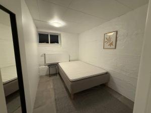 En eller flere senge i et værelse på lovely copenahgen apt