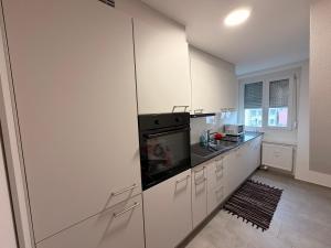 Una cocina o cocineta en Grandhouse Olten City Apartments