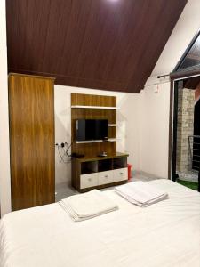 En eller flere senge i et værelse på Mermaid Avisa resort + 6 billeder