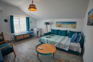 Postel nebo postele na pokoji v ubytování Poseidon Jurilovca