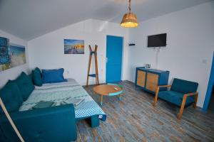 TV a/nebo společenská místnost v ubytování Poseidon Jurilovca