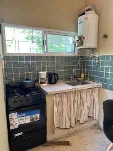 Η κουζίνα ή μικρή κουζίνα στο La Clementina 3