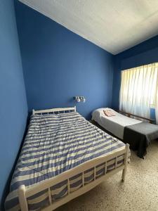 Ένα ή περισσότερα κρεβάτια σε δωμάτιο στο La Clementina 3