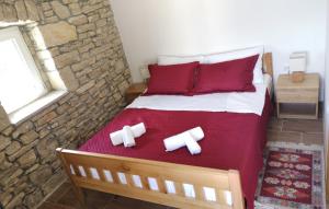 Ένα ή περισσότερα κρεβάτια σε δωμάτιο στο Juniper Stone Cottage by Villas Guide +20 φωτογραφίες