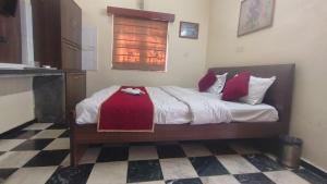 Postel nebo postele na pokoji v ubytování Collection O Upasana Park Newtown Formerly Hotel Nirwana