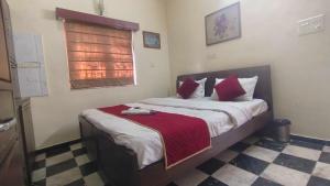 Postel nebo postele na pokoji v ubytování Collection O Upasana Park Newtown Formerly Hotel Nirwana