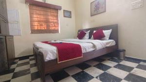 Postel nebo postele na pokoji v ubytování Collection O Upasana Park Newtown Formerly Hotel Nirwana