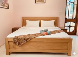 En eller flere senge i et værelse på Nature Reach Cottage