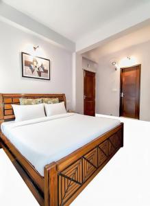 En eller flere senge i et værelse på Nature Reach Cottage