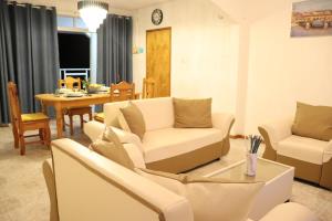 Posezení v ubytování Mountain Panoramic Suite