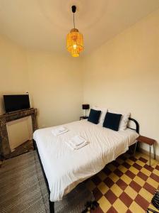 Postel nebo postele na pokoji v ubytování La pause du vignoble + 1 fotografie