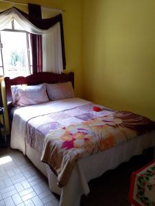 Postel nebo postele na pokoji v ubytování Casa simples e aconchegante em Cunha