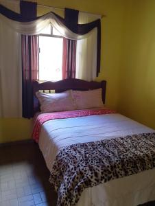 Postel nebo postele na pokoji v ubytování Casa simples e aconchegante em Cunha