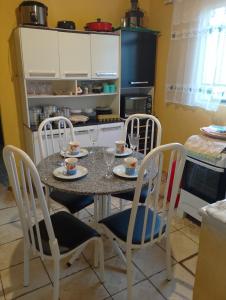 Kuchyň nebo kuchyňský kout v ubytování Casa simples e aconchegante em Cunha + 8 fotografií