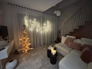 Posezení v ubytování Le cocon de Frêne