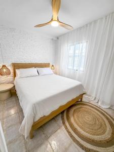 a bedroom with a bed and a ceiling fan at 3 BDR Detached house in Chayofa in Chayofa +35 photos