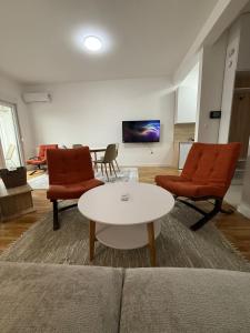 Μια τηλεόραση ή/και κέντρο ψυχαγωγίας στο Mountain View Lux Apartment