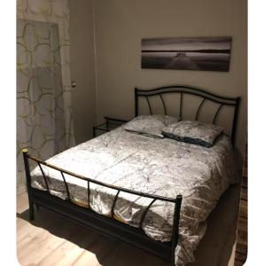 Postel nebo postele na pokoji v ubytování logement 4P avec spa 6P en intérieur