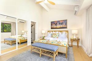 NEW Kuilima Estates KBM Resorts 2 Units 4 Bedrooms ML-2750 في Marconi: غرفة نوم بسريرين وشرفة +21 صورة