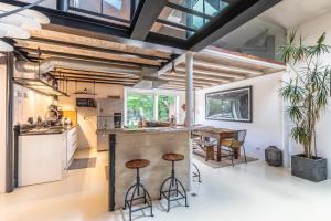 Η κουζίνα ή μικρή κουζίνα στο Lakaz - Loft à Seignosse +12 φωτογραφίες